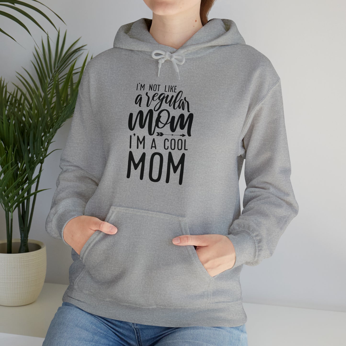 I'm not like a regular mom- Unisex Heavy Blend™ Hooded Sweatshirt