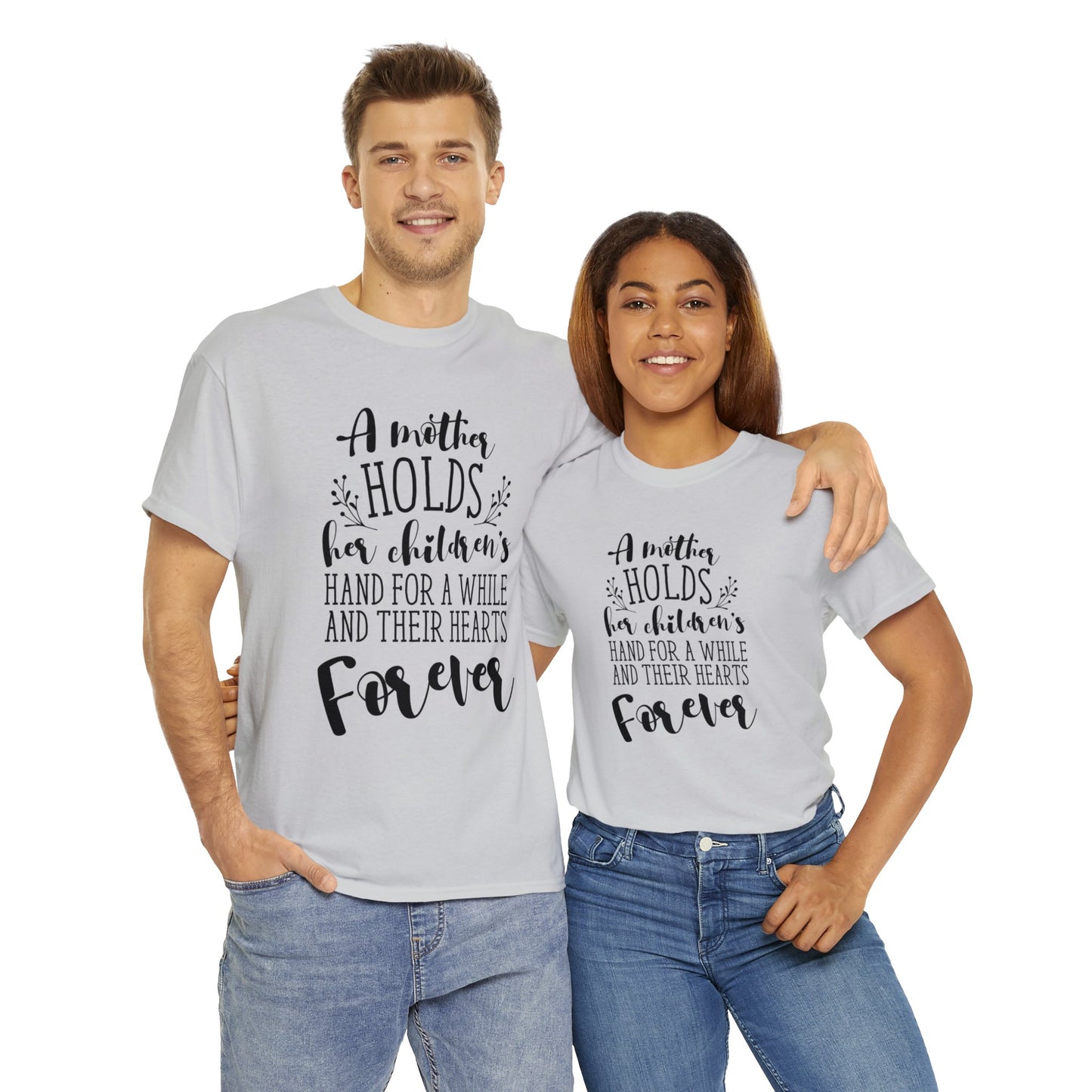 A mother holds her child's heart- Unisex Heavy Cotton Tee