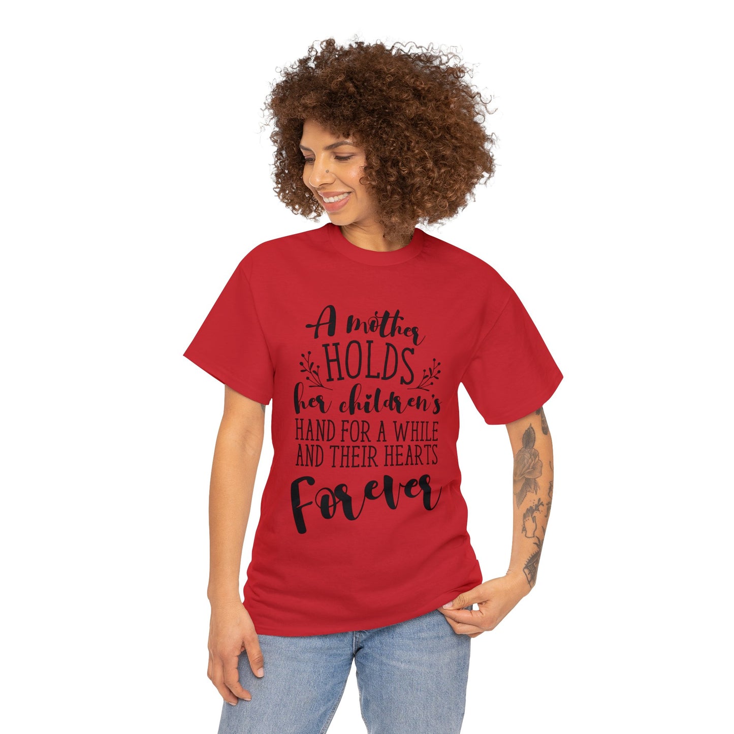 A mother holds her child's heart- Unisex Heavy Cotton Tee