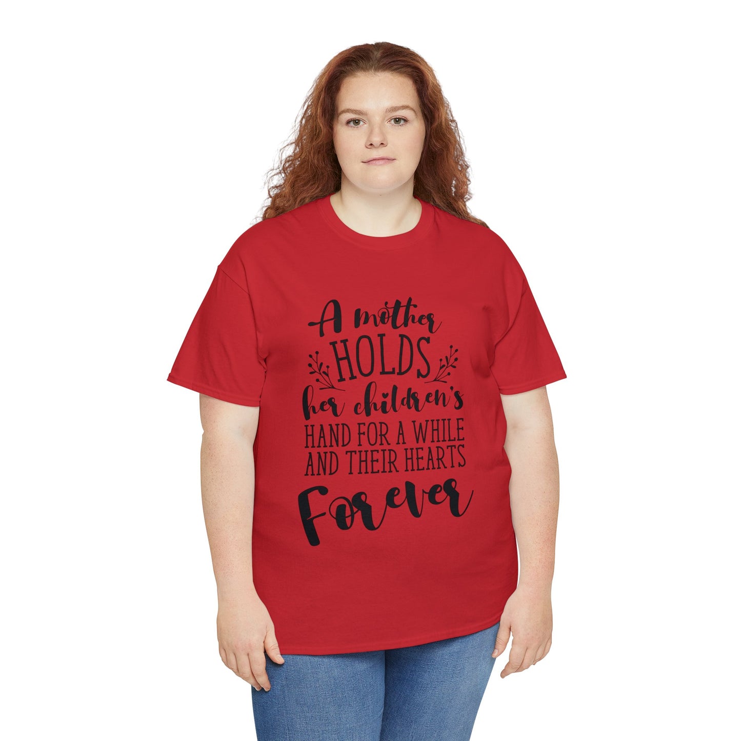 A mother holds her child's heart- Unisex Heavy Cotton Tee